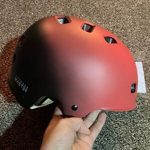 Red and Black Helmet by Triple Eight
